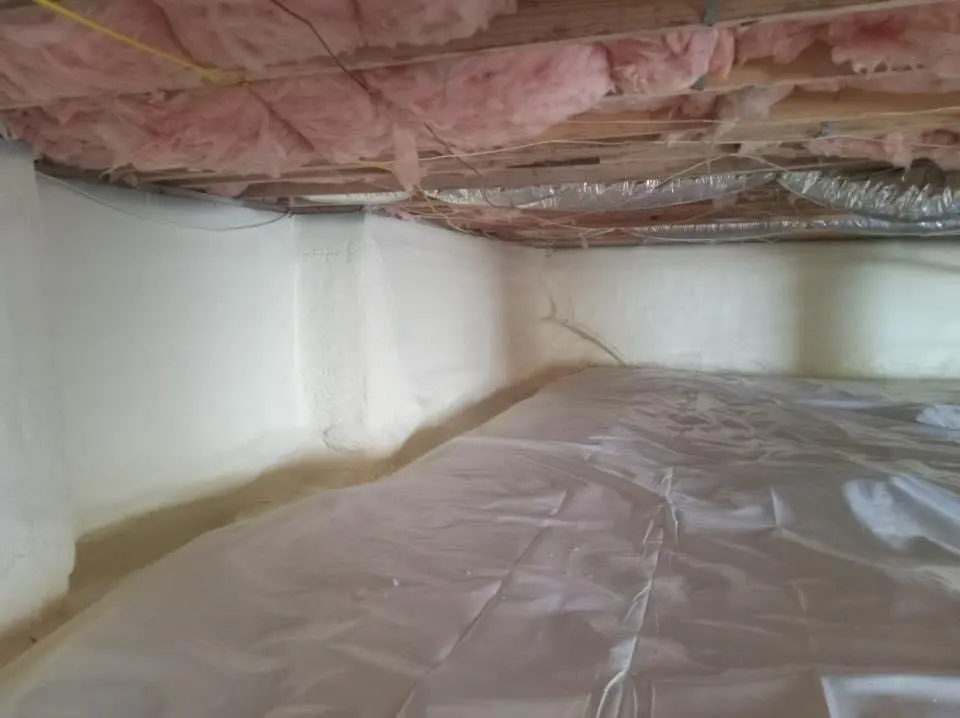 Crawl space encapsulation with closed-cell spray foam for Commercial Roof Restoration in Orchard Park